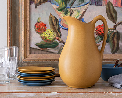 Large pitcher with plates